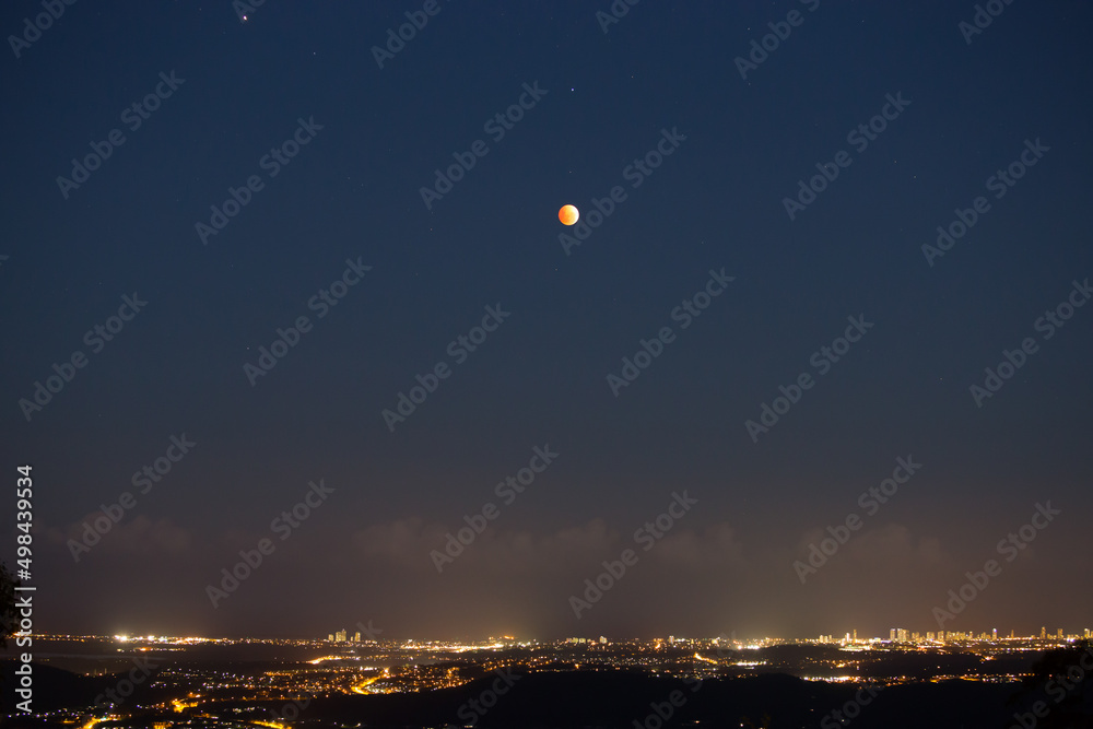 red Blood Full Moon Over Coastal City of Gold Coast in Evening