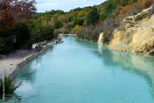 Ancient hot thermal springs and blue pool in nature park Dei Mulini  Bagno Vignoni  Tuscany  Italy