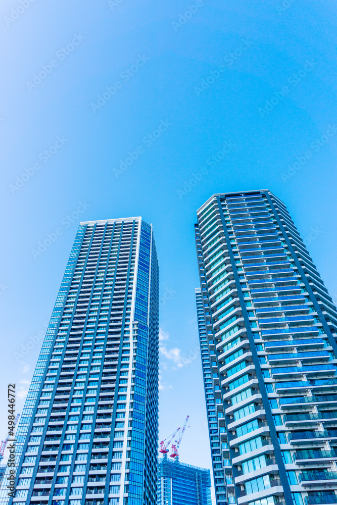 Landscape photograph looking up at a high-rise apartment_c_62
