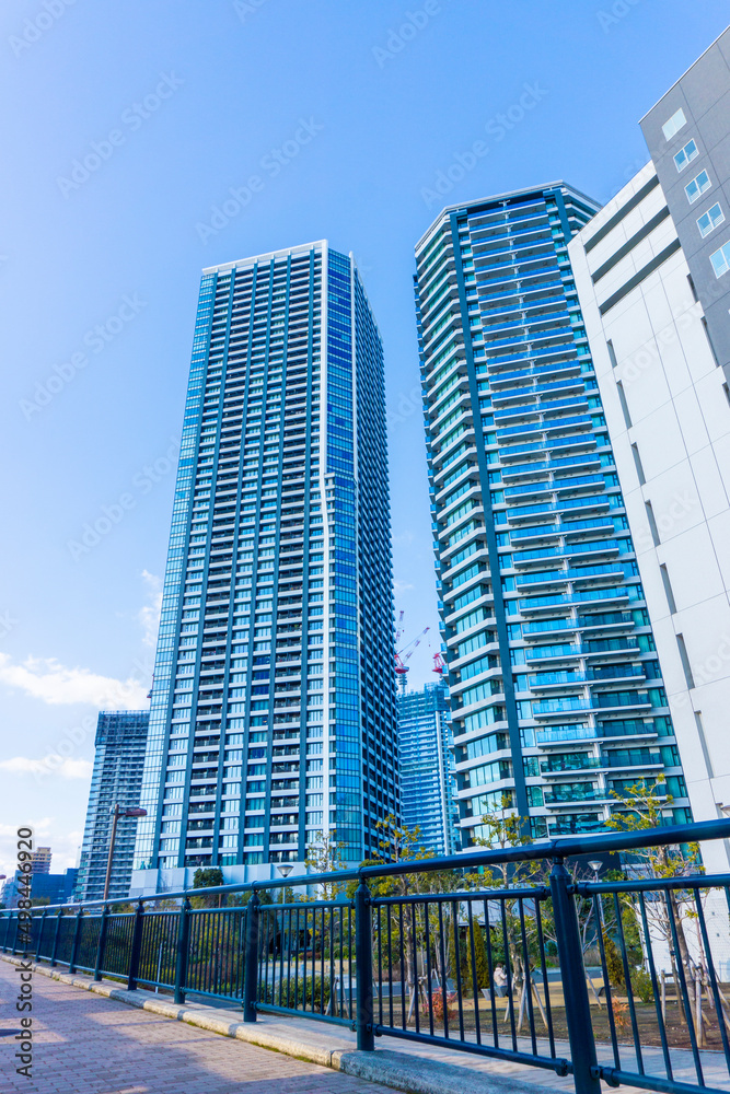 Landscape photograph looking up at a high-rise apartment_c_64 Landscape photograph looking up at a high-rise apartment_c_64