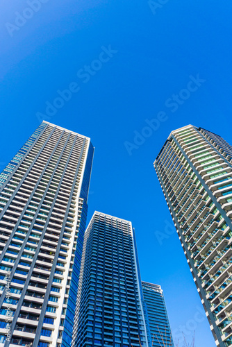 Landscape photograph looking up at a high-rise apartment_c_65