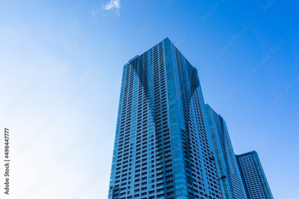 Landscape photograph looking up at a high-rise apartment_c_74