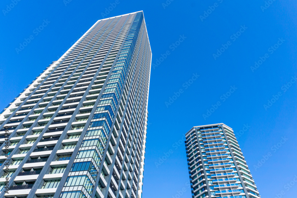 Landscape photograph looking up at a high-rise apartment_c_78