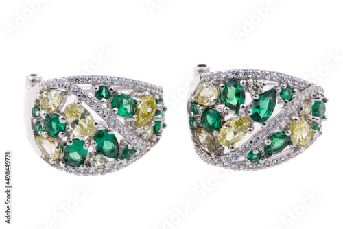 Diamond earrings, isolated. Beautiful earrings with different color gemstones.