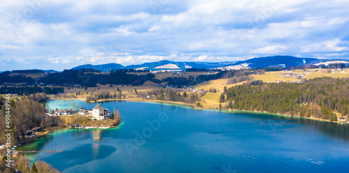 Drone photography from castle Fuschl on the shore of mountain lake Fuschlsee near Salzburg, Upper Austria, Europe. March 4, 202
