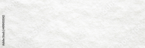 White dry sea salt background. Top down view. Wide banner. Empty place for text.