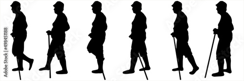 A group of older people with walking sticks in their hands. The tourist walks, step by step. A man in a cap, shorts, with a cane in his hand. Six black female silhouettes are isolated on a white.