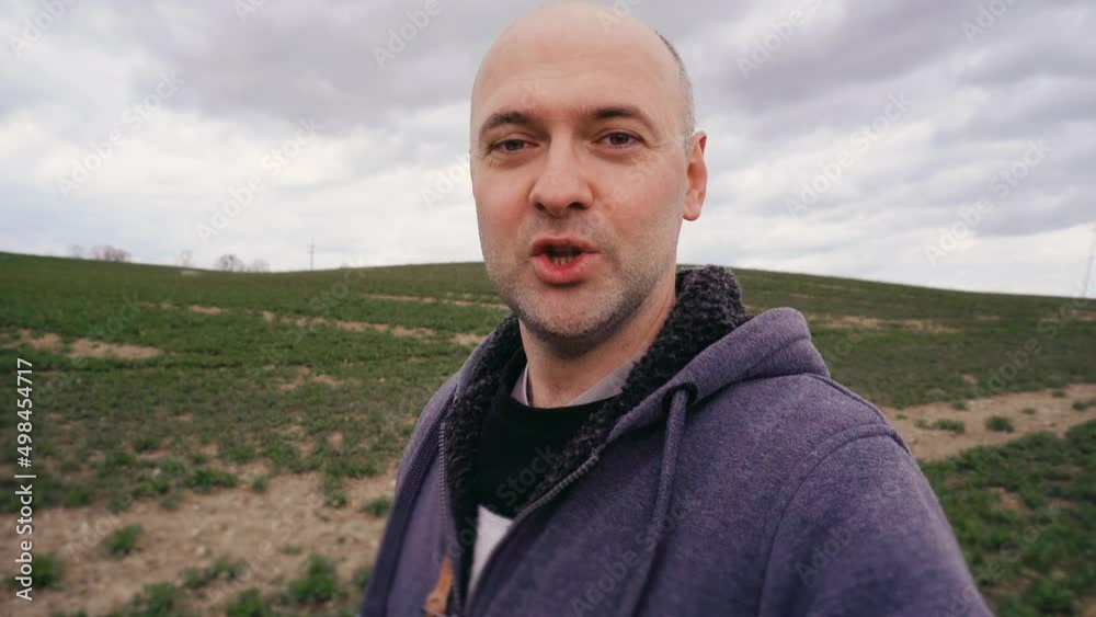 Happy farmer talking about increasing the yield on crops of grain wheat. Remote employee conferencing agro workers online. Concept of work in agronomic farm and production organic food