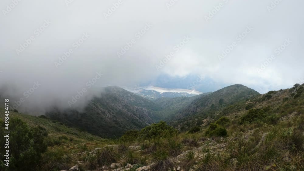 4k Wide shot of mountains and clouds from the mountain La Concha, Marbella, Spain. 4k Wide shot of mountains and clouds from the mountain La Concha, Marbella, Spain.