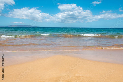 Calm sea beach background. Summer tropical beach with sand. Ocean water. Natural seascape. © Volodymyr