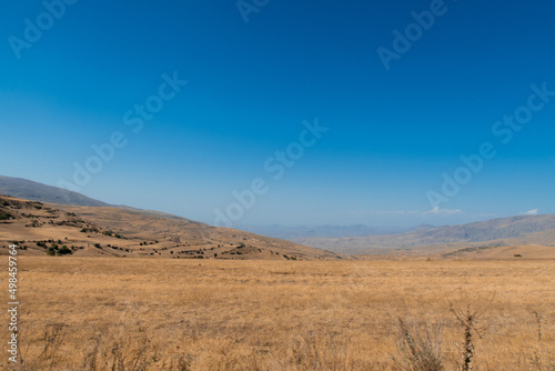 Picturesque Armenian autumn landscape in the backgrounds. Fields and meadows in the mountains of Armenia region. Stock photography