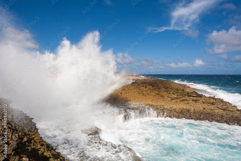 Wave crashing into Boka Pistol bay, Curaçao