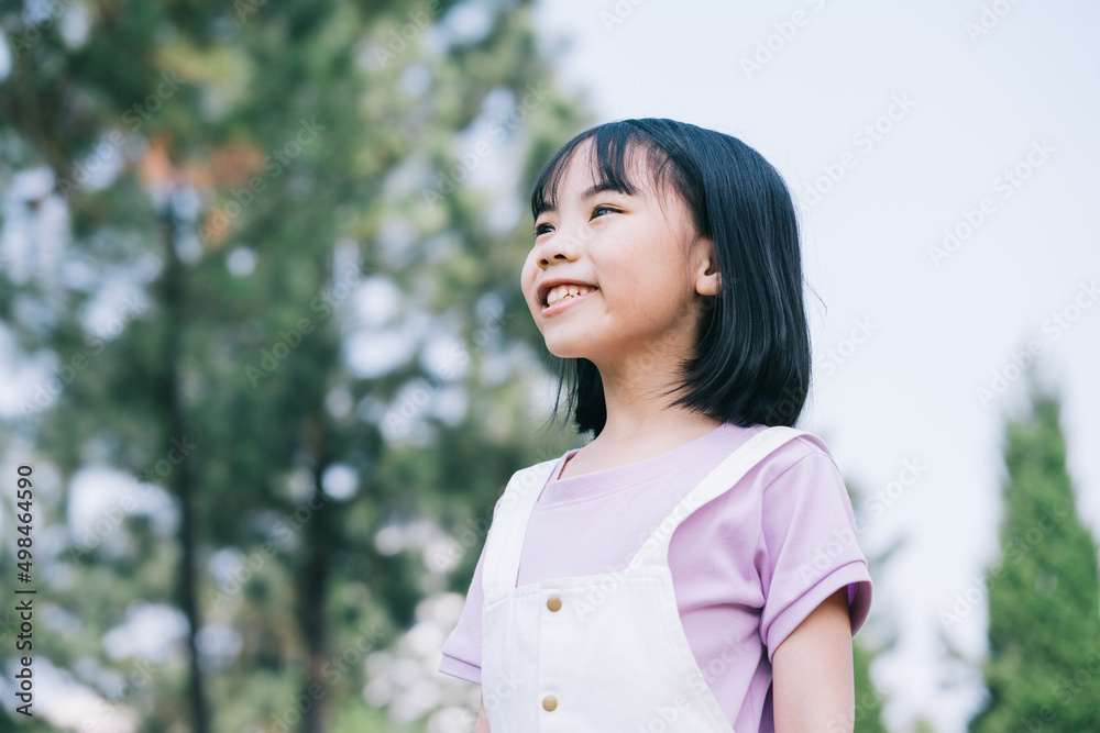 Portrait of Asian little girl playing in the park Portrait of Asian little girl playing in the park