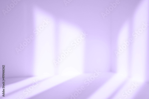 Fototapeta Naklejka Na Ścianę i Meble -  Empty purple corner. Abstract studio background for product presentation. 3d room with shadows of window. Minimalistic space concept with blurred backdrop.
