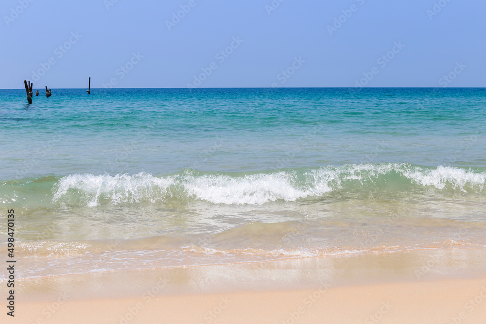Peaceful clean beach with clear sea water wave, tropical island in south of Thailand, summer holiday destination in Asia