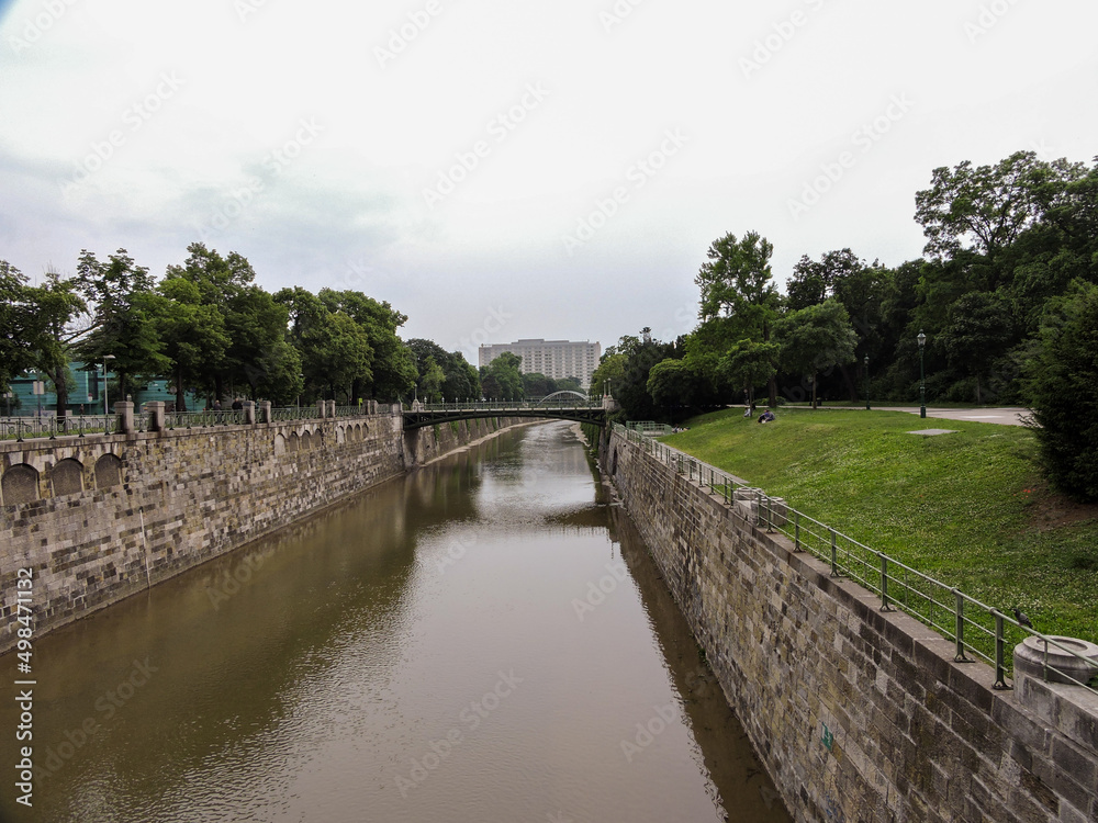 Vienna Austria Canal and Foot Bridge with Grass Embankment