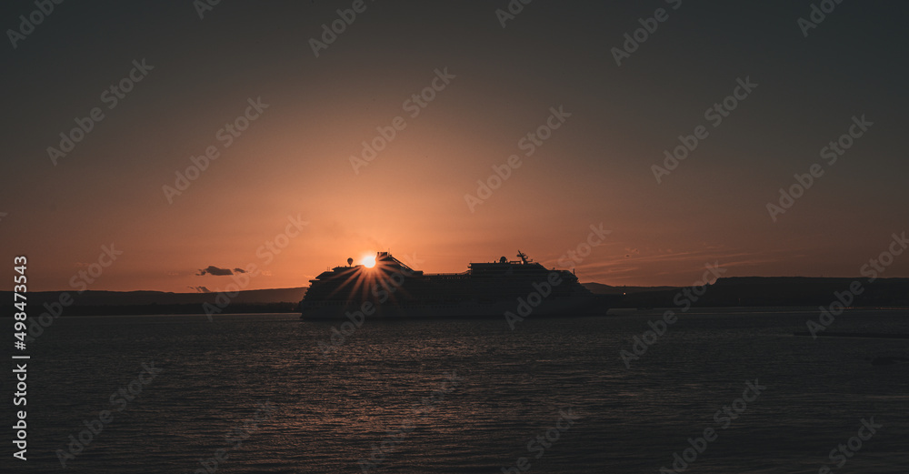 cruise ship in the sunset