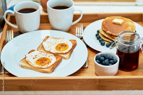 The perfect way to start the day. Still life shot of breakfast on a tray.