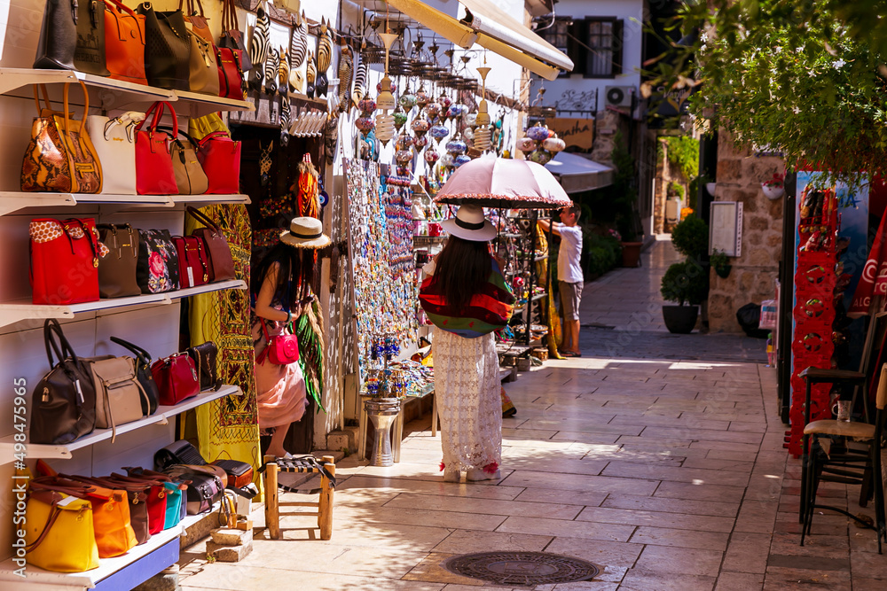 Fototapeta premium street in the old town of Kaleici, Antalya. Tourists are walking and shopping