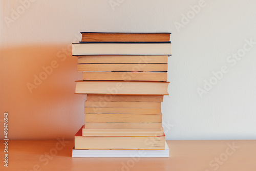 Pile of books on a piece of furniture