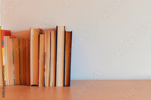 Bookshelf with books together photo