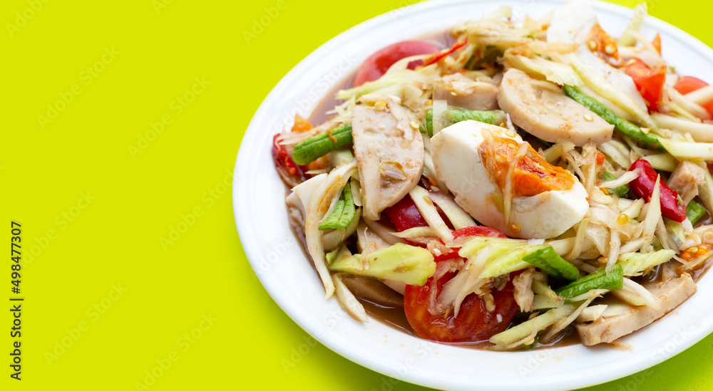 Spicy papaya salad with salted egg and vietnamese pork sausage Spicy papaya salad with salted egg and vietnamese pork sausage