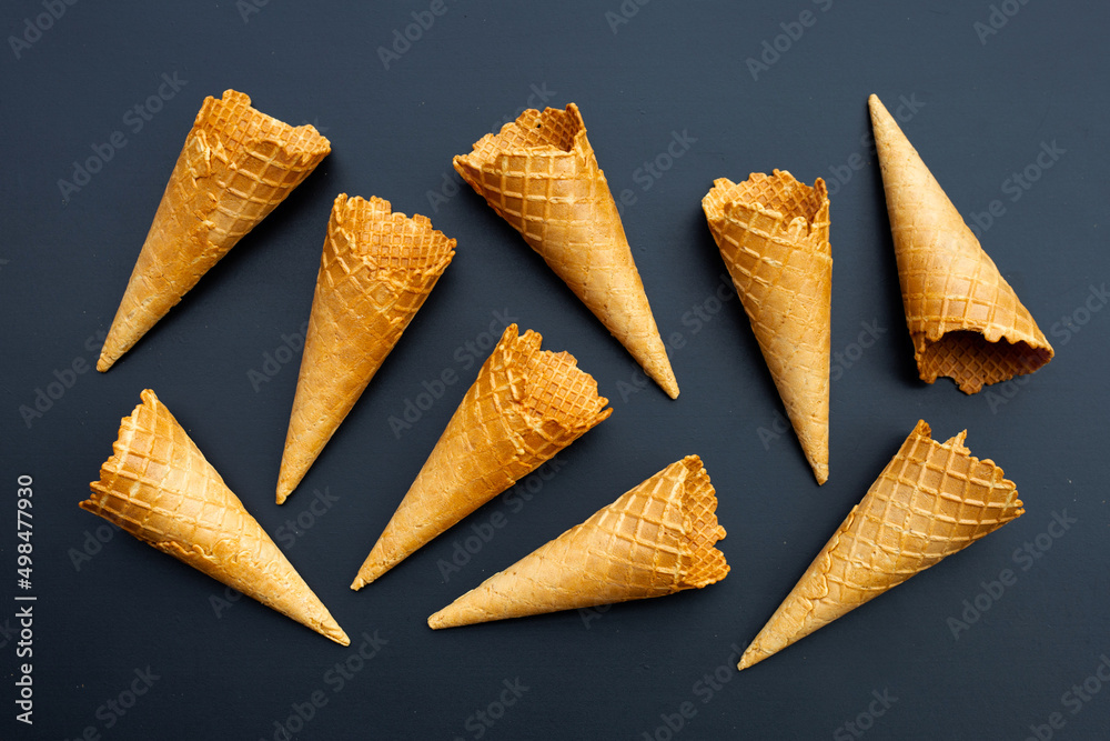 Empty ice cream cone on dark background. Empty ice cream cone on dark background.