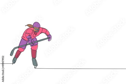 Single continuous line drawing of young professional ice hockey player hit the puck and attack on ice rink arena. Extreme winter sport concept. Trendy one line draw design graphic vector illustration