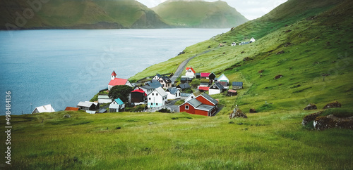Spectacular view of Traditional village of Hvannasund on the Faroe islands located on the island of Vidoy, Faroe Islands, Denmark photo