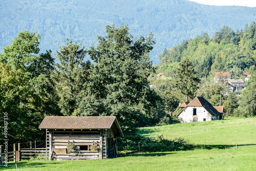 house in the mountains, digital photo picture as a background , taken in bled lake area, slovenia, europe photo