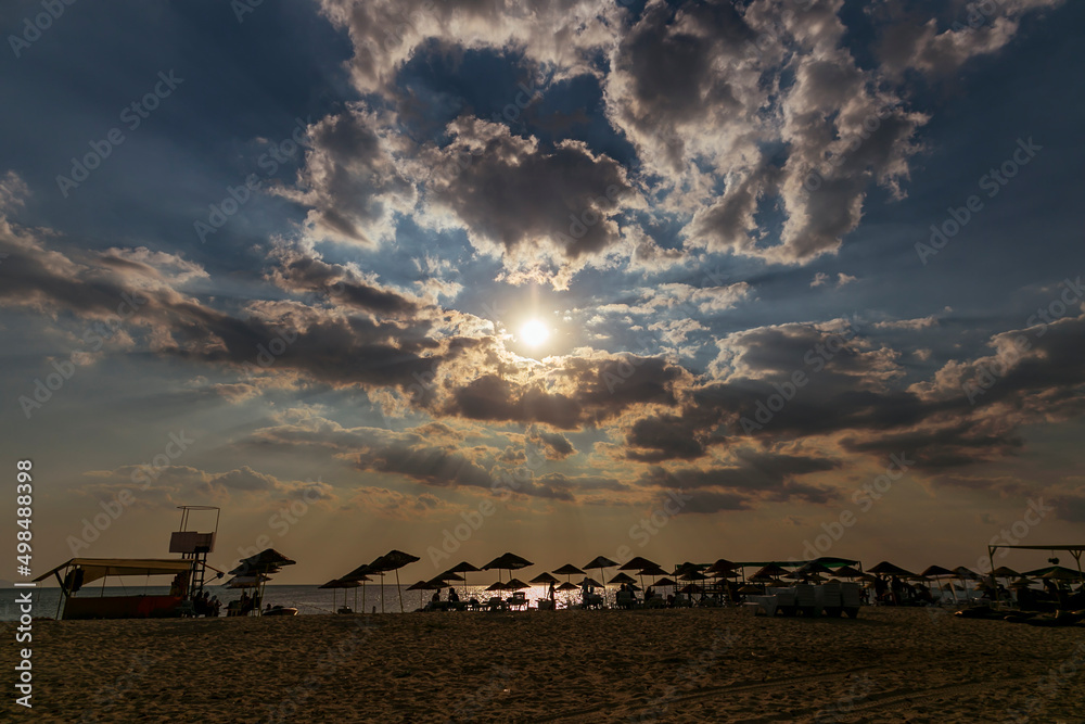 sunset on the beach. natural clouds with blue sky