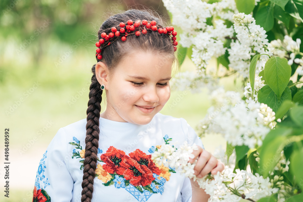 vyshyvanka day. Child in traditional embroidery. Ukraines Constitution day. 24 August. Patriotic holiday. outdoor portrait of girl. Ukraine's Independence Day. Flag Day. Patriotic holiday. vyshyvanka day. Child in traditional embroidery. Ukraines Constitution day. 24 August. Patriotic holiday. outdoor portrait of girl. Ukraine's Independence Day. Flag Day. Patriotic holiday.