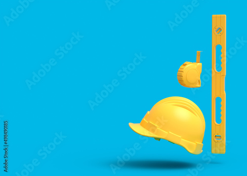 Fototapeta Naklejka Na Ścianę i Meble -  Flying view of yellow construction tools for repair on blue background