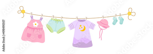 Baby clothes drying on a rope. Vector illustration
