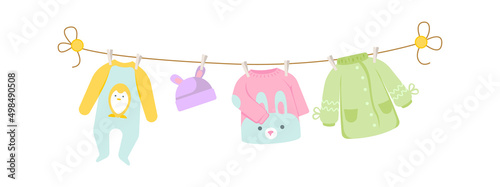 Baby clothes drying on a rope. Vector illustration