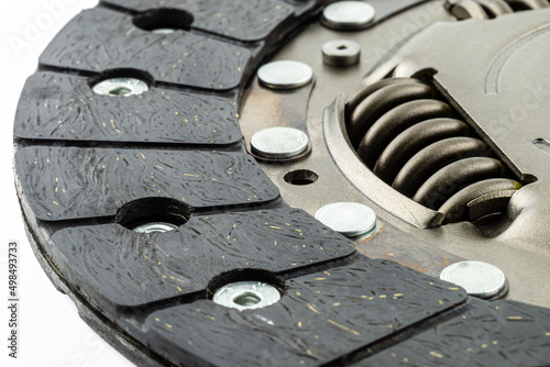 Quadro em tela Used car clutch with damper springs and friction linings, isolated on a white background