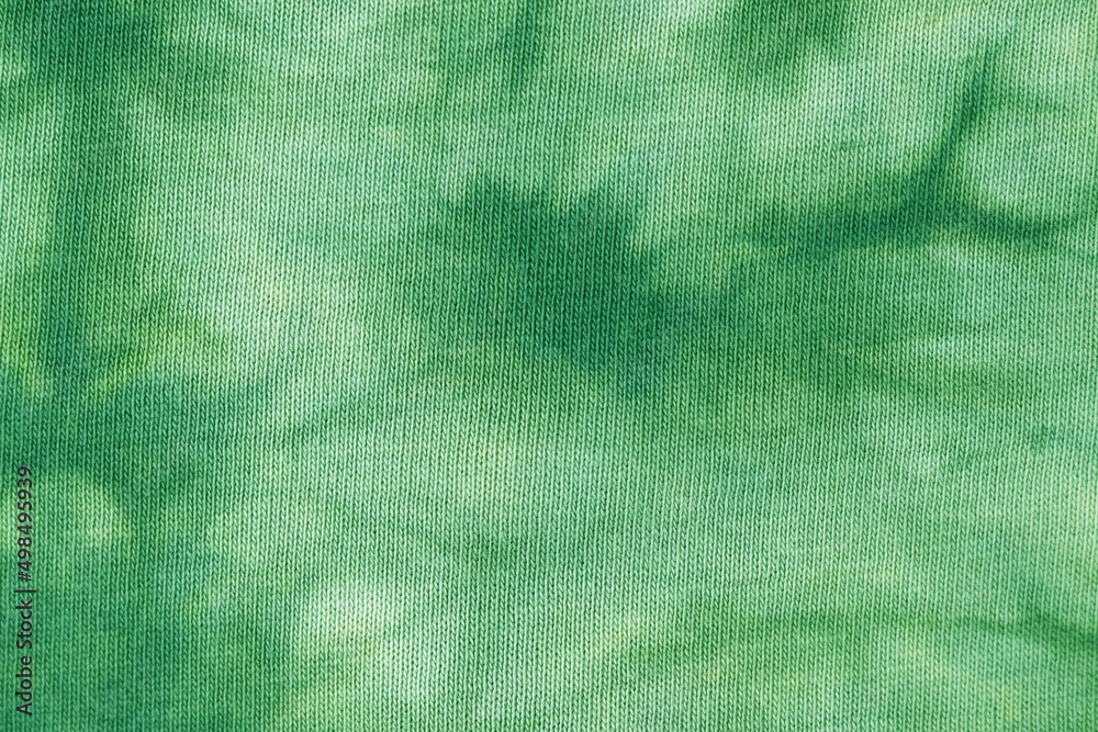 Obraz premium Green color fabric background texture. Surface of fabric texture in green forest tone color.