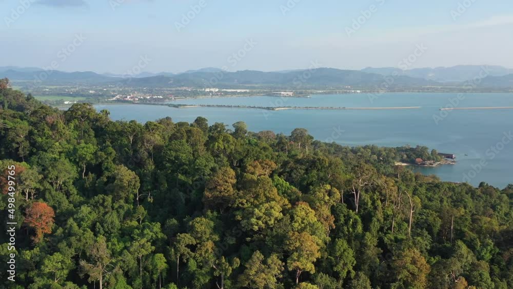 Tilt up shot from telaga harbor marina reveals beautiful mountain landscape and strait of malacca at langkawi island, kedah, archipelago of malaysia. Tilt up shot from telaga harbor marina reveals beautiful mountain landscape and strait of malacca at langkawi island, kedah, archipelago of malaysia.