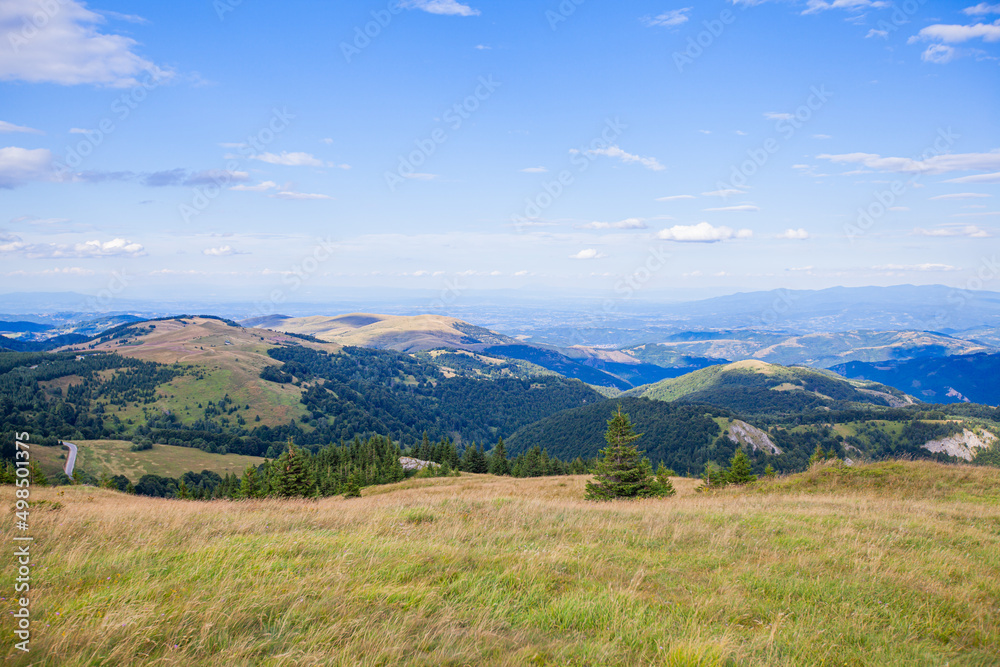 Summer Countryside Mountain Nature Landscape. Picturesque Scenery Green Hills And Fields. Beautiful Blue Sky With Clouds. Visually attractive View Of Mountain Kopaonik, Serbia, Europe.