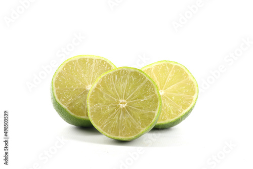 A close-up of limes isolated on white
