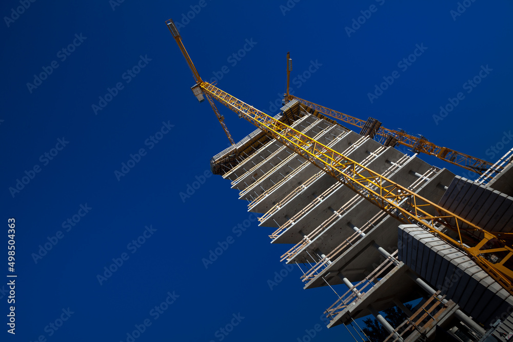 Construction tower crane building a skyscraper in Slovenia Europe