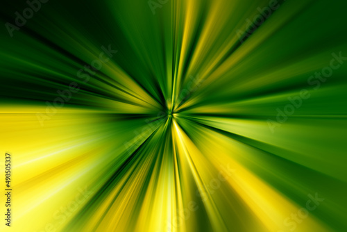 Abstract radial zoom blur surface of dark green and yellow tones. Bright green background with radial, radiating, converging lines. 