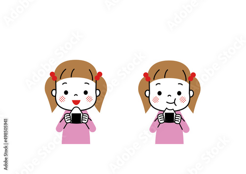 おにぎりをおいしそうに食べる女の子　もぐもぐ