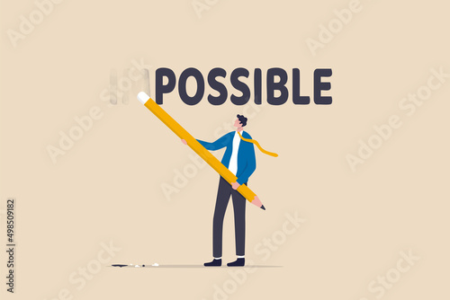 Make it possible, erase im word from impossible and believe we can do it, challenge or hope to overcome difficulty and achieve success concept, businessman using eraser to delete im from impossible. photo
