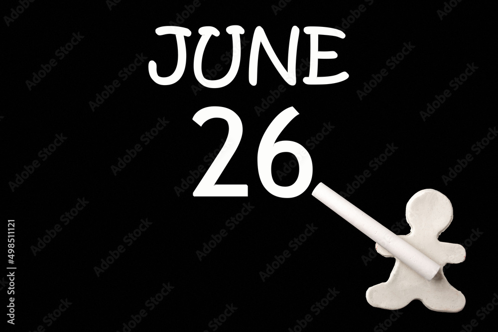 26th day of June. A small white plasticine man writing the date 26 June on a black board. Business concept. Education concept. Summer month, day of the year concept. 26th day of June. A small white plasticine man writing the date 26 June on a black board. Business concept. Education concept. Summer month, day of the year concept.