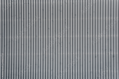 Architectural detail of grey corrugated steel facade