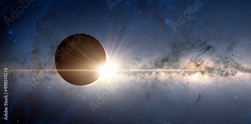 Solar Eclipse with Milky way galaxy in the background "Elements of this image furnished by NASA "