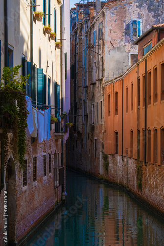 Clothes drying in the windows of the narrow canals of Venice, Italy