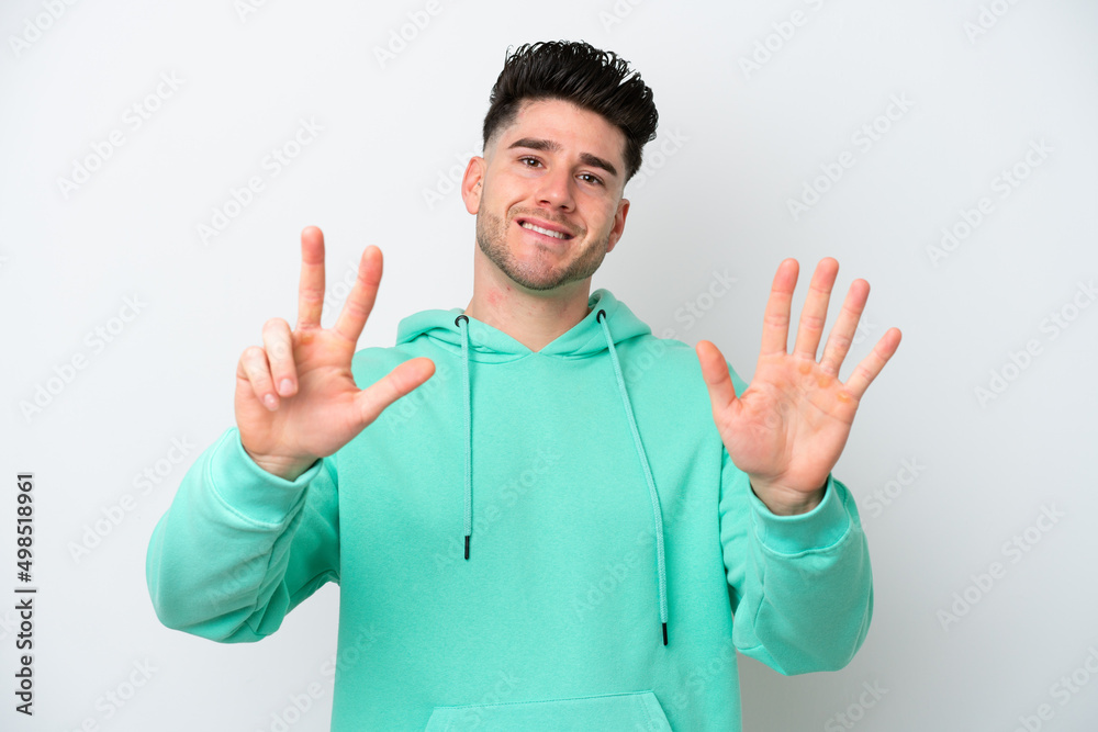 Young caucasian man isolated on white background counting eight with fingers Young caucasian man isolated on white background counting eight with fingers