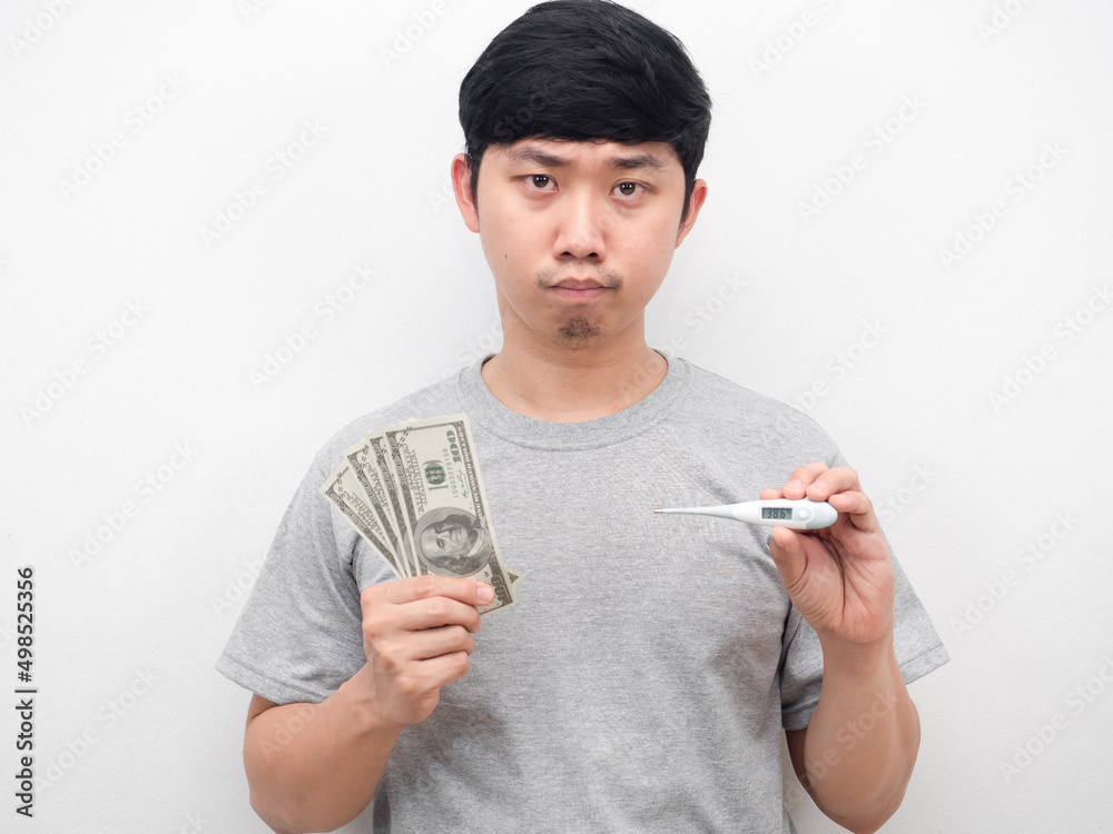 Man bored emotion holding thermometer with money white background portrait